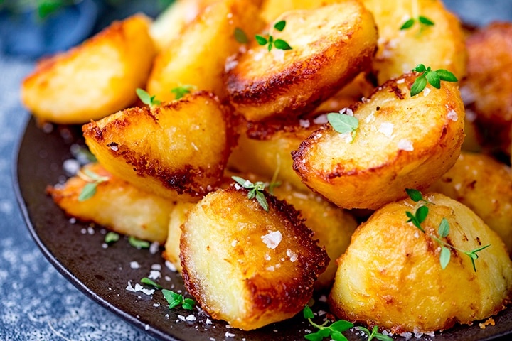 Roast-potatoes-with-salt-and-fresh-thyme-leaves-wide-FS
